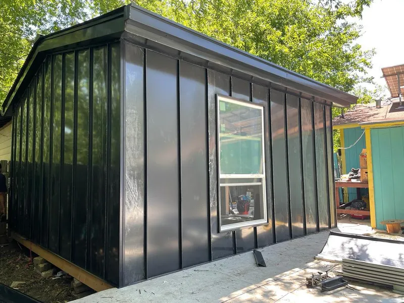 Black standing seam metal wall panels for Roof Inspection in Northvale