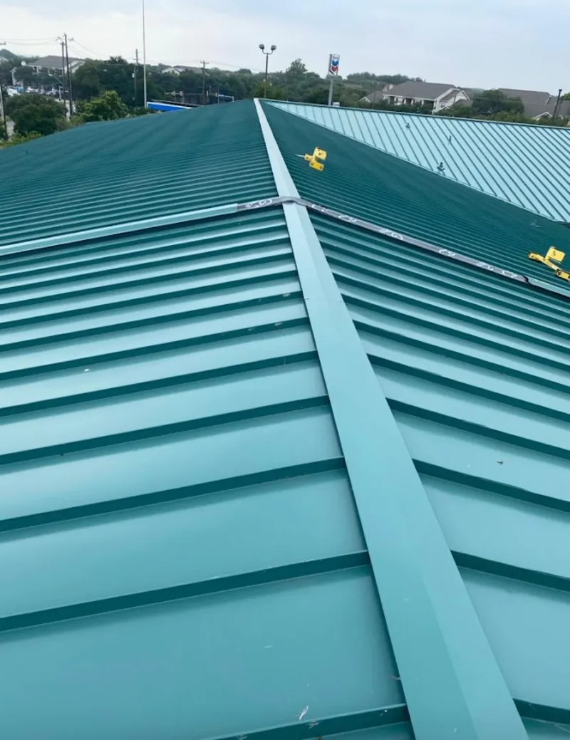Green commercial metal roof ridge and valley for Metal Roof Repair in Northvale